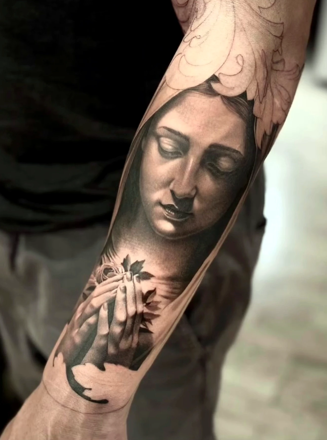 Black and grey realism portrait of a praying woman by Rav Singh at Inkology
