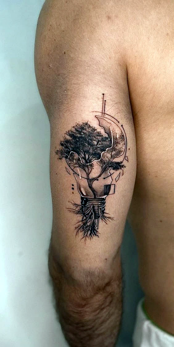 Black and grey lightbulb tree on the upper arm by Rav Singh at Inkology